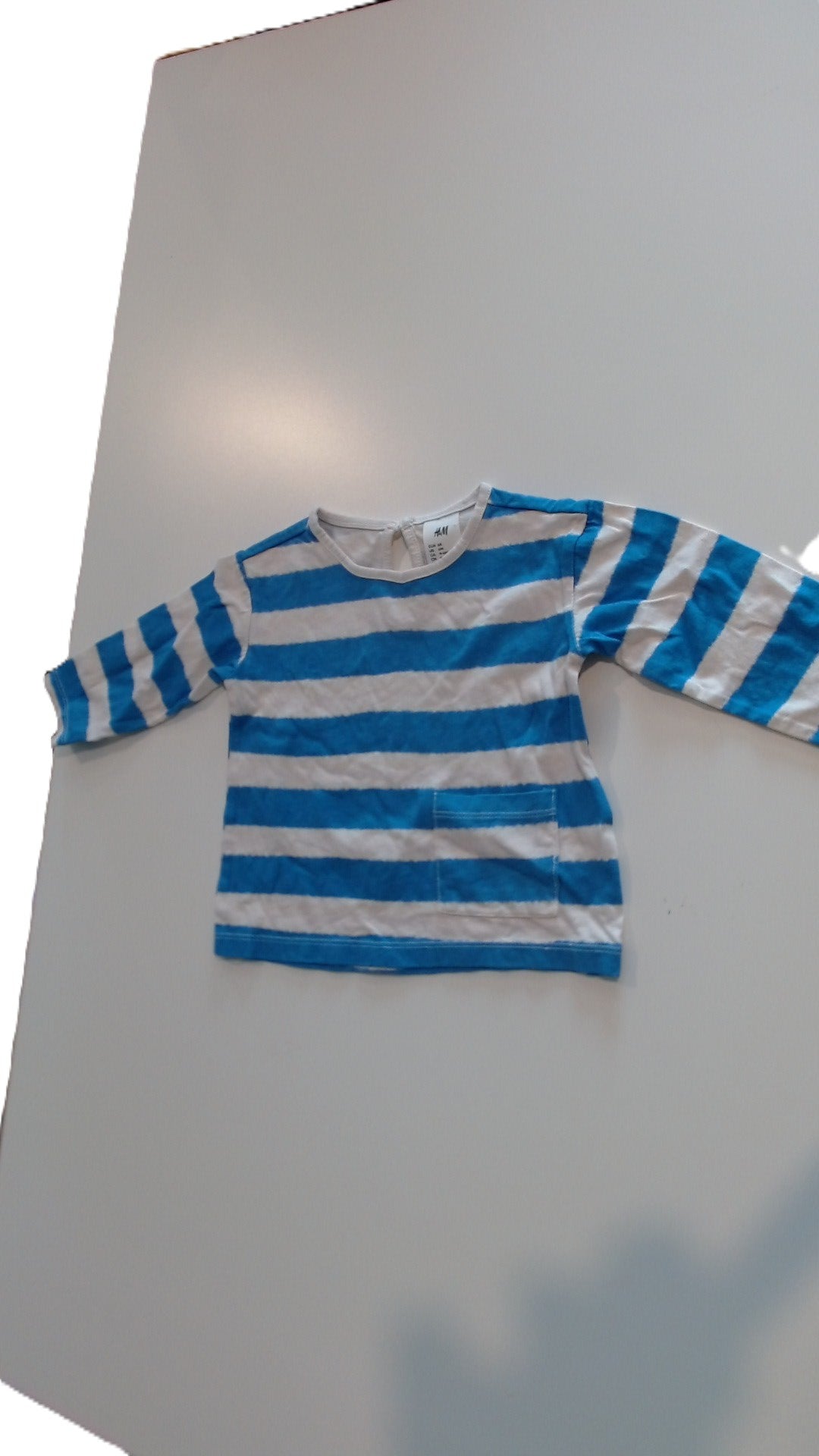 Chandail H&M — 4-6 mois — vêtement enfant seconde main | Boutique Ecomini